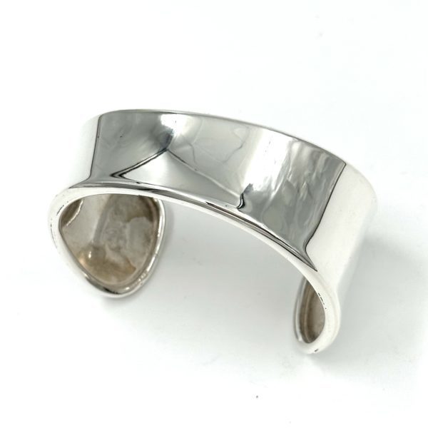 Oxidized brass bangle bracelet by Robert Lee Morris on artnet